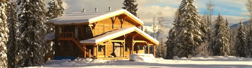 Timber frame homes in snow